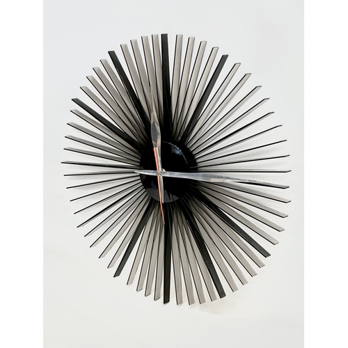 98 - A Mid Century sunburst wall clock. 50cm