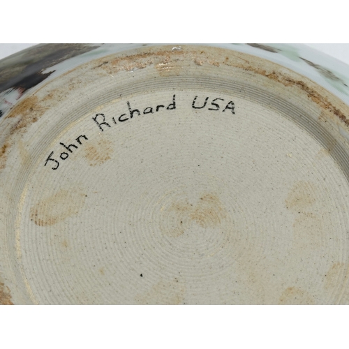 59 - A large glazed porcelain curved rim bowl designed by John Richard. 32x32x11cm