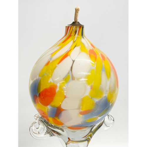 279 - A Splatter glass oil burner. 34cm