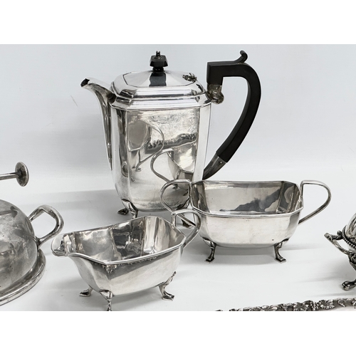 283 - A collection of 19th and Early 20th Century silver plate. A John H Lunn silver plated tray 59cm. A W... 