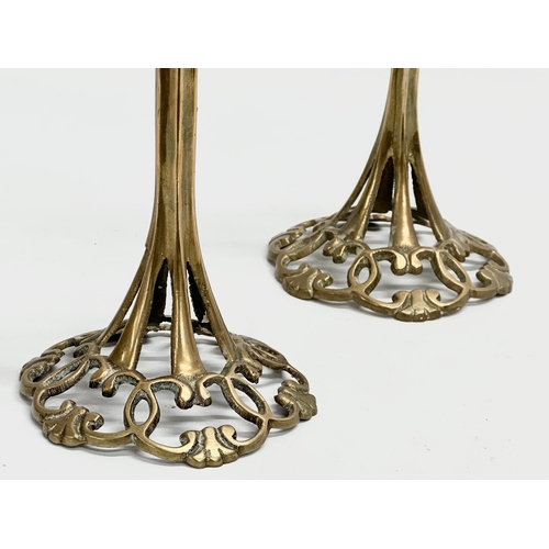 285 - A pair of Art Nouveau brass candlesticks. Circa 1900. 24cm