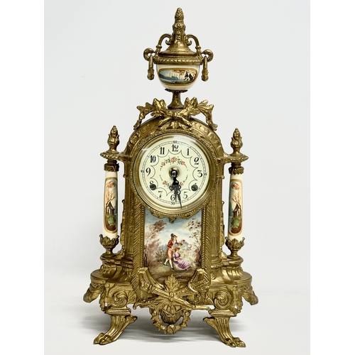 43 - An 18th century style Franz Hermle brass clock set. Clock measures 22x41cm.