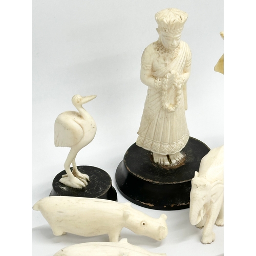 289 - A collection of 19th and Early 20th Century bone figurines. 1 plastic.