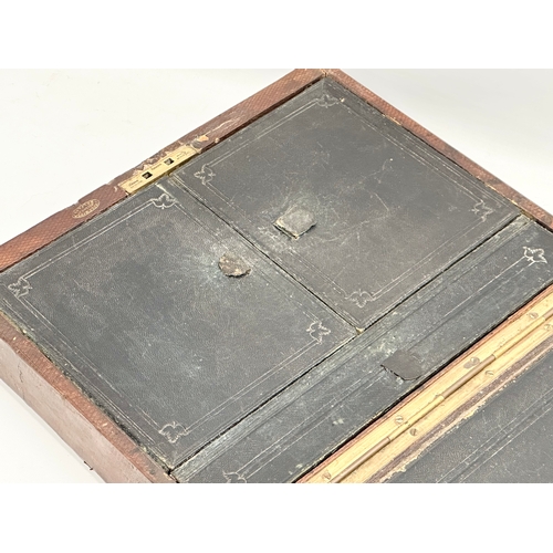 309 - A 19th Century Victorian leather travel writing slope. Belfast maker. Open 60x36cm. Closed 36x29x11c... 