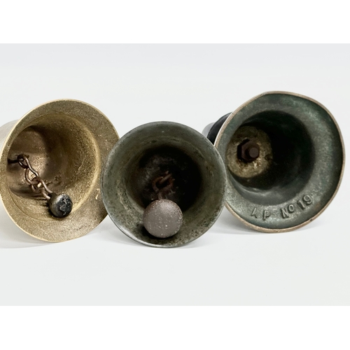 311 - 19th and 20th century brass bells. 19cm