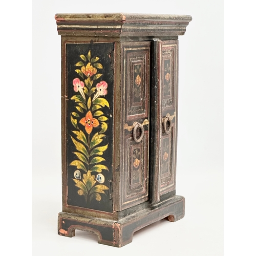 326 - A vintage hand painted tabletop cabinet. 20x11x33cm