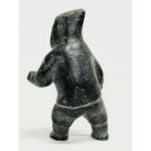 328 - A soapstone Eskimo hunter. 12cm