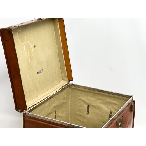 331 - A Late 19th/Early 20th Century leather bound steamers trunk. 51x43x40cm