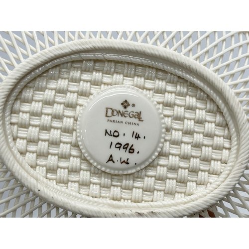 334 - A Donegal pottery woven basket. 25x20x6cm