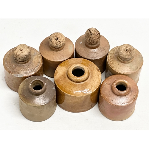 338 - A collection of 19th Century stoneware ink bottles. 7cm