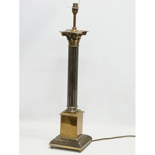 200 - A large vintage brass table lamp with Corinthian style column. Base measures 17x17x74cm.