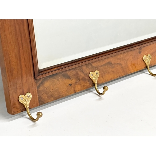 55 - A 19th Century Victorian mahogany mirror back hat and coat rack. 106x16.5x56cm