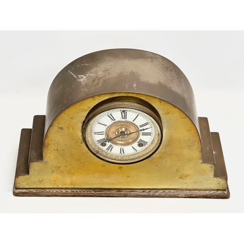 344 - A Late 19th Century brass mantle clock by Ansonia Clock Co. With pendulum. 44x15x27cm