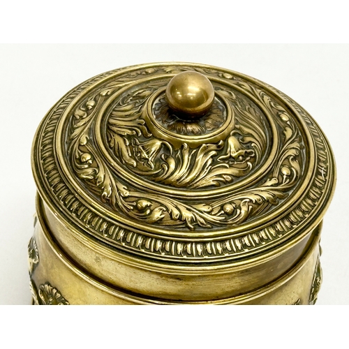 347 - A Late 19th Century brass tobacco jar with lid. 11x13cm