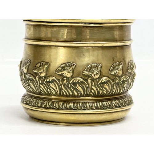 347 - A Late 19th Century brass tobacco jar with lid. 11x13cm