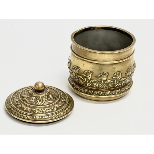 347 - A Late 19th Century brass tobacco jar with lid. 11x13cm