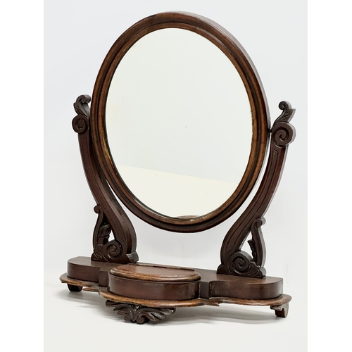 368 - A Victorian mahogany dressing mirror.