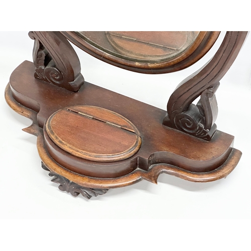 368 - A Victorian mahogany dressing mirror.