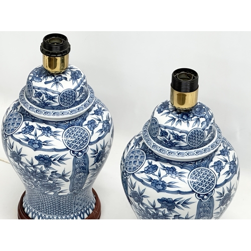 358 - A pair of large Chinese style pottery table lamps. 19x37cm