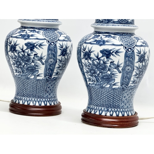 358 - A pair of large Chinese style pottery table lamps. 19x37cm