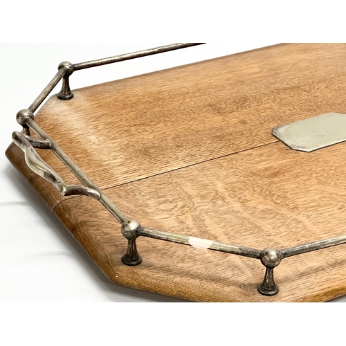 369 - An Early 20th Century oak and silver plated serving tray. Circa 1910-1920. 55x50x7cm