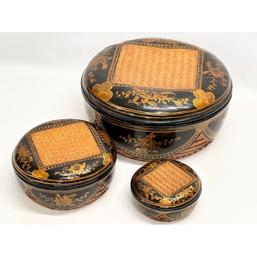 374 - 3 Japanese hand painted lacquered baskets with lids. 33x16cm