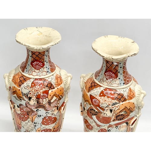 399C - A pair of large Late 19th Century Japanese Satsuma vases, together with a pair of Early 20th Chinese... 