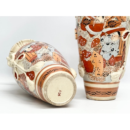 399C - A pair of large Late 19th Century Japanese Satsuma vases, together with a pair of Early 20th Chinese... 