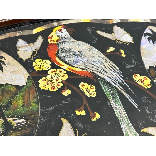 398 - A Mid 20th Century Brazilian serving tray with Mother of Pearl parrot and butterfly design. 70x41cm