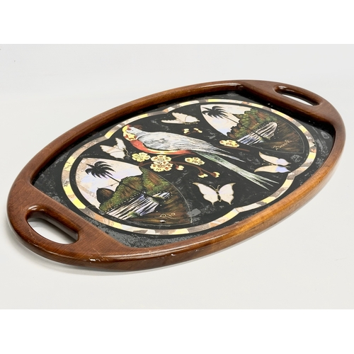 398 - A Mid 20th Century Brazilian serving tray with Mother of Pearl parrot and butterfly design. 70x41cm