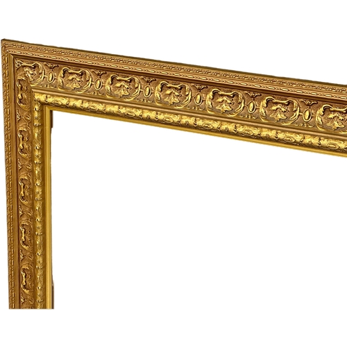 398A - A large good quality Victorian style gilt framed bevelled mirror. 122x96cm