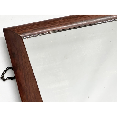 180 - A Victorian rosewood framed mirror. 61x60cm