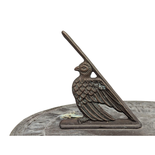 35 - A cast iron sundial, Victorian case with later top. 83cm