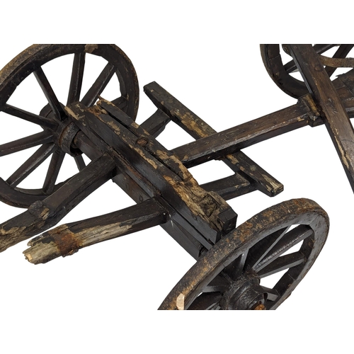 380 - A 19th Century cart. 134x64x51cm