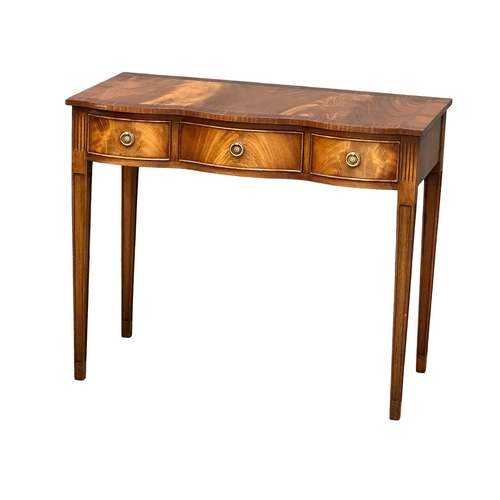 1257 - A Hepplewhite style mahogany side table with 3 drawers. 94x49x78cm