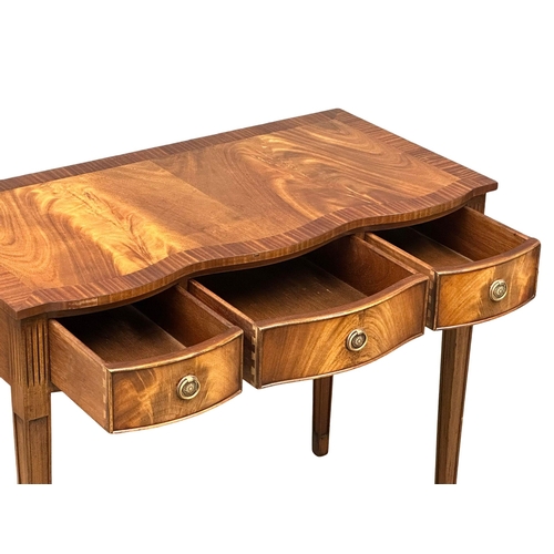 1257 - A Hepplewhite style mahogany side table with 3 drawers. 94x49x78cm