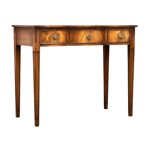 1257 - A Hepplewhite style mahogany side table with 3 drawers. 94x49x78cm