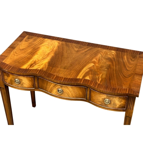 1257 - A Hepplewhite style mahogany side table with 3 drawers. 94x49x78cm