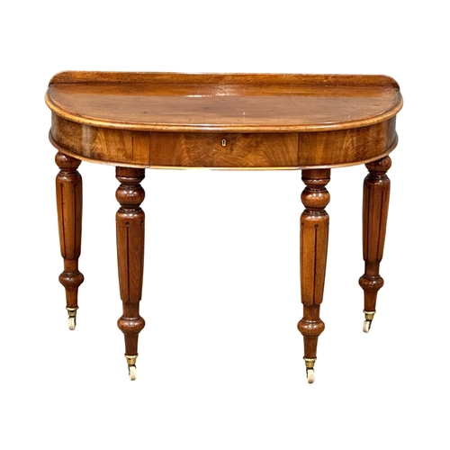 1253 - A Victorian mahogany gallery back demi-loon front hall table with drawer, 107x55x80cm