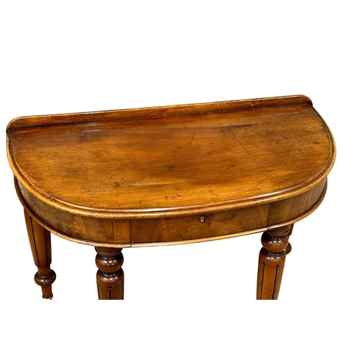 1253 - A Victorian mahogany gallery back demi-loon front hall table with drawer, 107x55x80cm