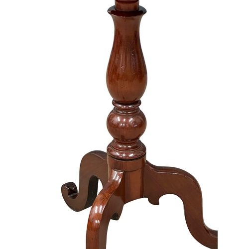 1243 - A Victorian mahogany pedestal table. 47x74cm