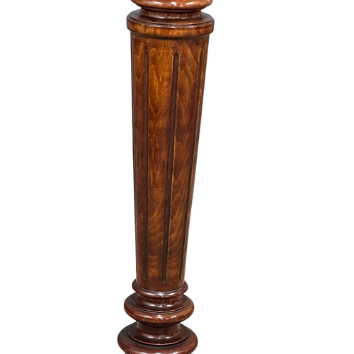 1259 - A large Victorian style jardiniere stand. 111cm