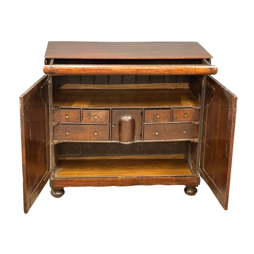 1249 - An 18th century George III mahogany side cabinet with hidden drawer and multi interior drawers. Circ... 