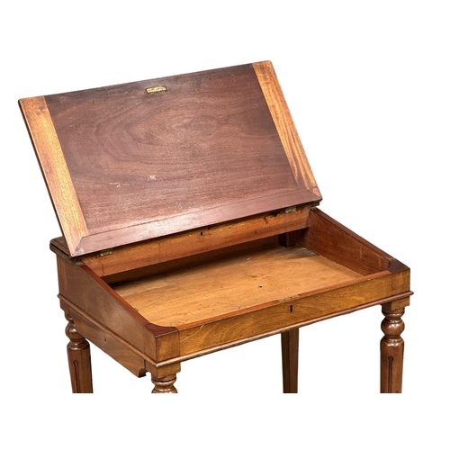 1250 - A Victorian mahogany writing desk with leather top hidden drawer. 70x49x78cm