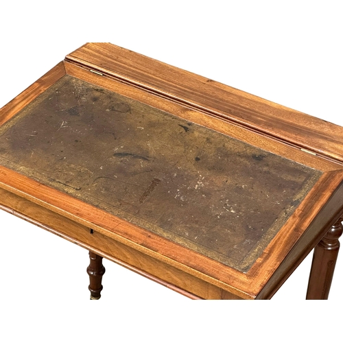 1250 - A Victorian mahogany writing desk with leather top hidden drawer. 70x49x78cm