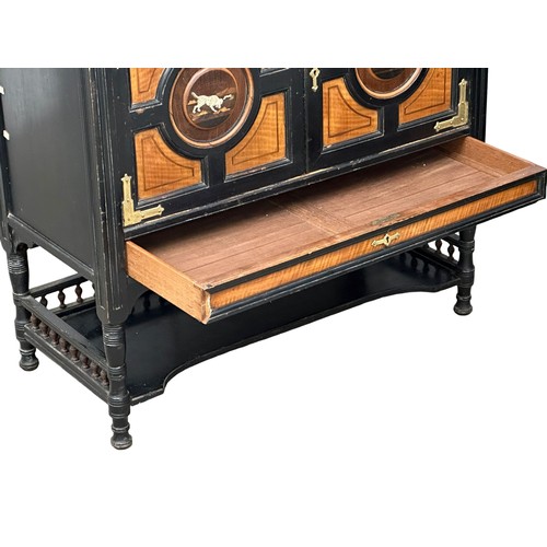 866 - A Late 19th Century Hobbs & Co ebony Chinese style aesthetic movement side cabinet in the manner of ... 