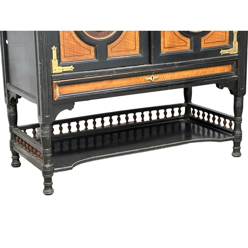 866 - A Late 19th Century Hobbs & Co ebony Chinese style aesthetic movement side cabinet in the manner of ... 