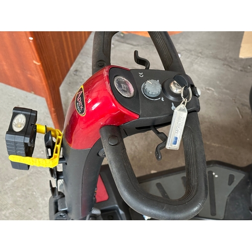 53 - An Apex Rapid mobility scooter with charger and key.