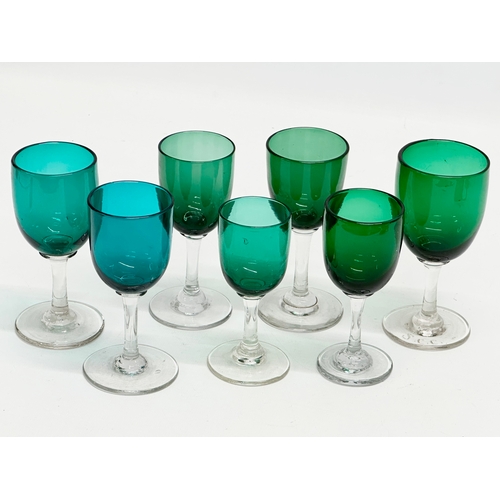 62 - A set of 7 19th Century Victorian Bristol Green and Turquoise port glasses. Circa 1860-1880. 13cm. 1... 