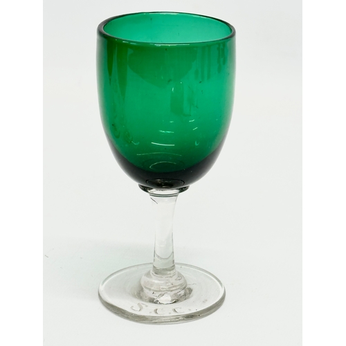 62 - A set of 7 19th Century Victorian Bristol Green and Turquoise port glasses. Circa 1860-1880. 13cm. 1... 